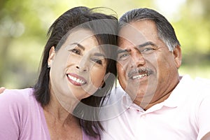 Portrait Of Senior Couple In Park