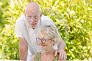 Portrait of a senior couple sitting on a sofa