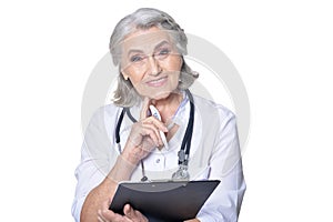 Portrait of senior female doctor with folder