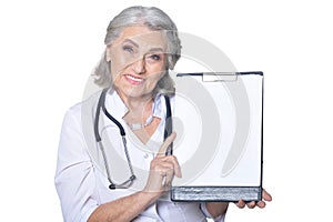 Portrait of senior female doctor with folder