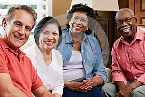 Portrait Of Senior Friends At Home Together