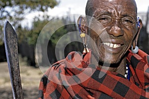 Portrait senior Maasai man with stretched earlobes