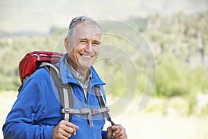 Portrait Of Senior Man On Hike