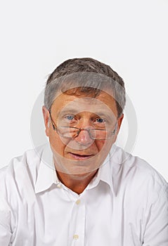 Portrait of a senior man with reading-glasses