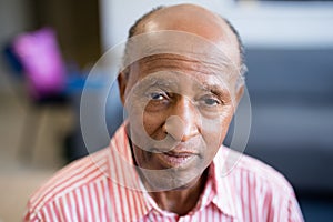 Portrait of senior man with receding hairline photo