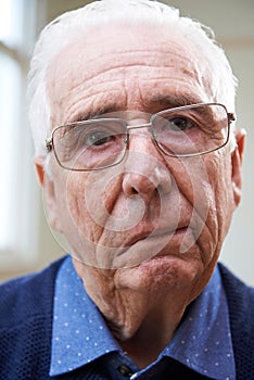 Portrait Of Senior Man Suffering From Stroke
