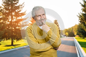 Portrait of a senior man thinking about something.