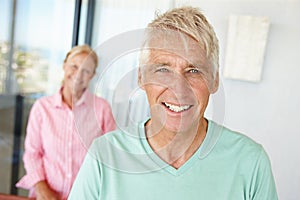 Portrait, senior man and woman in house with happiness, retirement and pensioner at home. Mature couple, smile and