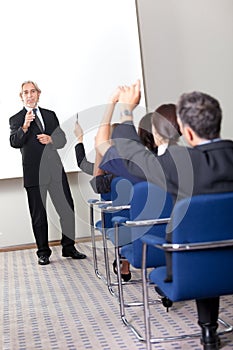 Portrait of a senior manager giving presentation