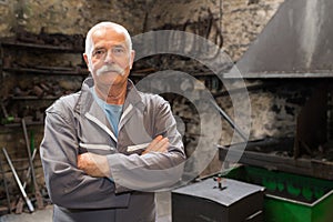 Portrait of senior metalworker