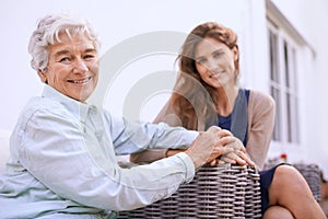 Portrait, senior and mother in nursing home together with daughter, outdoor and woman to visit wise mom. Girls, smile