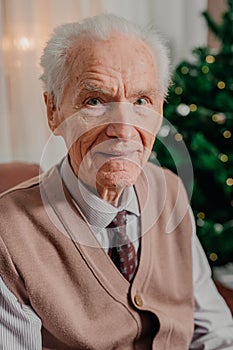 Portrait of Senior Retired Man Sitting at Home