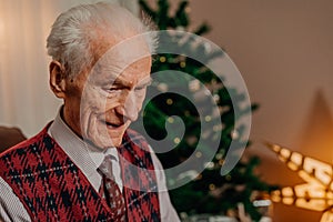 Portrait of Senior Retired Man Sitting at Home