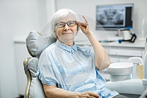 Portrait of a senior woman at the dental office