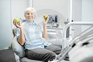 Portrait of a senior woman at the dental office