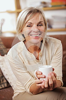 Portrait of senior woman having a cup of coffee