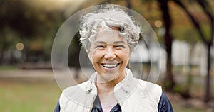 Portrait, senior woman and smile in the park with happiness in nature, woods or outdoor for a walk in retirement. Happy