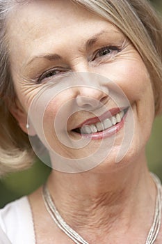 Portrait Of Senior Woman Smiling At Camera