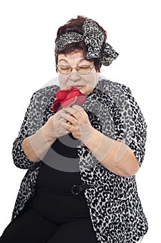 Portrait of senior woman on a white background