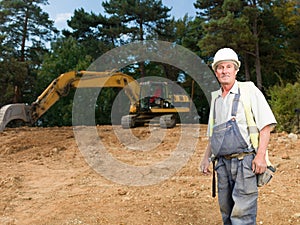 Portrait of senior worker on construction site