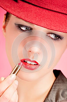 Portrait of sensuality stylish woman in red hat