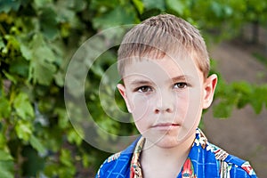 Portrait of serious 8-year-old boy