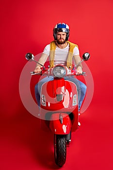 Portrait of serious angry driver of motorcycle isolated