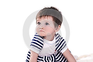 Portrait of serious baby girl, isolated on white