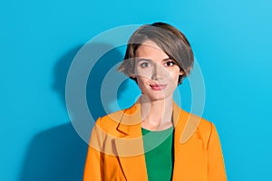 Portrait of serious business lady wear orange jacket stylish blazer outfit formal uniform office admin isolated on blue