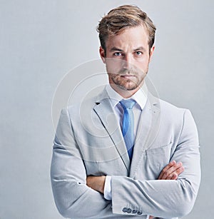 Portrait, serious and business man with arms crossed in studio for corporate career or job in Germany isolated on white