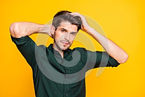 Portrait of serious guy had bought new anti dander effect shampoo touch his hair look mirror feel thoughtful wear casual photo
