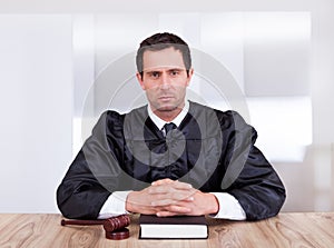 Portrait of serious male judge