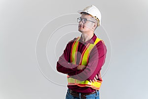 Portrait of serious young foreman with hard hat in a studio. Architect, Engineer, Civil Concept of Construction