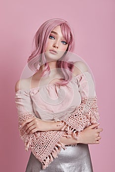 Portrait of a sexy young woman with pink hair. Perfect hairstyle and hair coloring. Girl with beautiful blue eyes and long pink