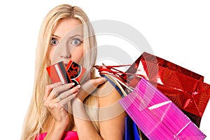 Portrait of shopper with bags and discount card photo