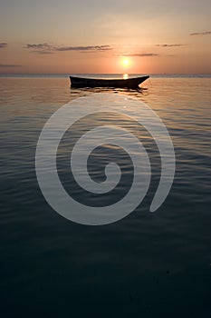 Portrait shot of row boat at sunset in africa zanz