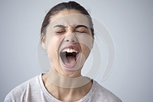 Portrait of shouting young woman