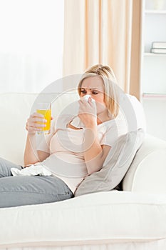 Portrait of a sick blond-haired woman
