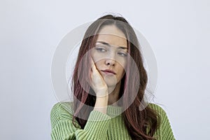 Portrait of Sick Woman having Toothache. Beautiful Girl Sick. Holding on to Tooth White Background.