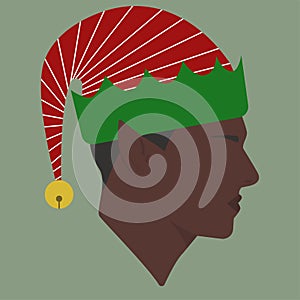 Portrait. Silhouette. A Christmas black elf in a hat with a bell. Avatar. Man head silhouette. Man Flat illustration.