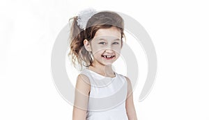 Portrait of a happy six-year-old girl against white background