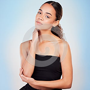 Portrait, skincare or beauty of woman in makeup for glow, shine or health isolated on blue studio background. Face