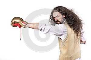 Portrait of a skinny nerd punching with a boxing glove