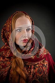 Portrait of slavonic girl with red braided hair photo