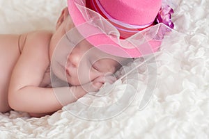 Newborn Baby Girl Wearing a Fancy Pink Hat