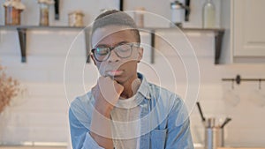 Portrait of Sleeping Young African Man in Office