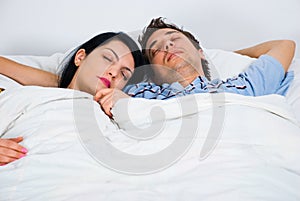 Portrait of sleeping young couple