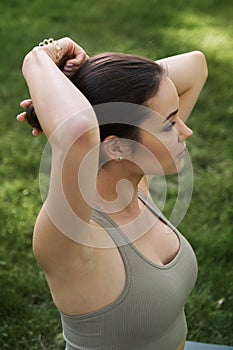 Portrait of a slender girl. A beautiful young woman is preparing for yoga or sports