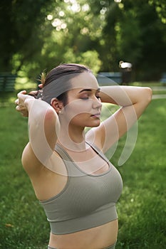 Portrait of a slender girl. A beautiful young woman is preparing for yoga or sports