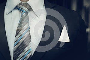 Portrait of smart business man close up wearing formal suit and